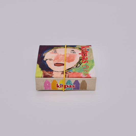 Small box with colorful design and 'kitpas' branding on a light gray background