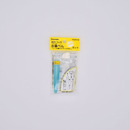 Packaged watercolor brush and water reservoir with a white background