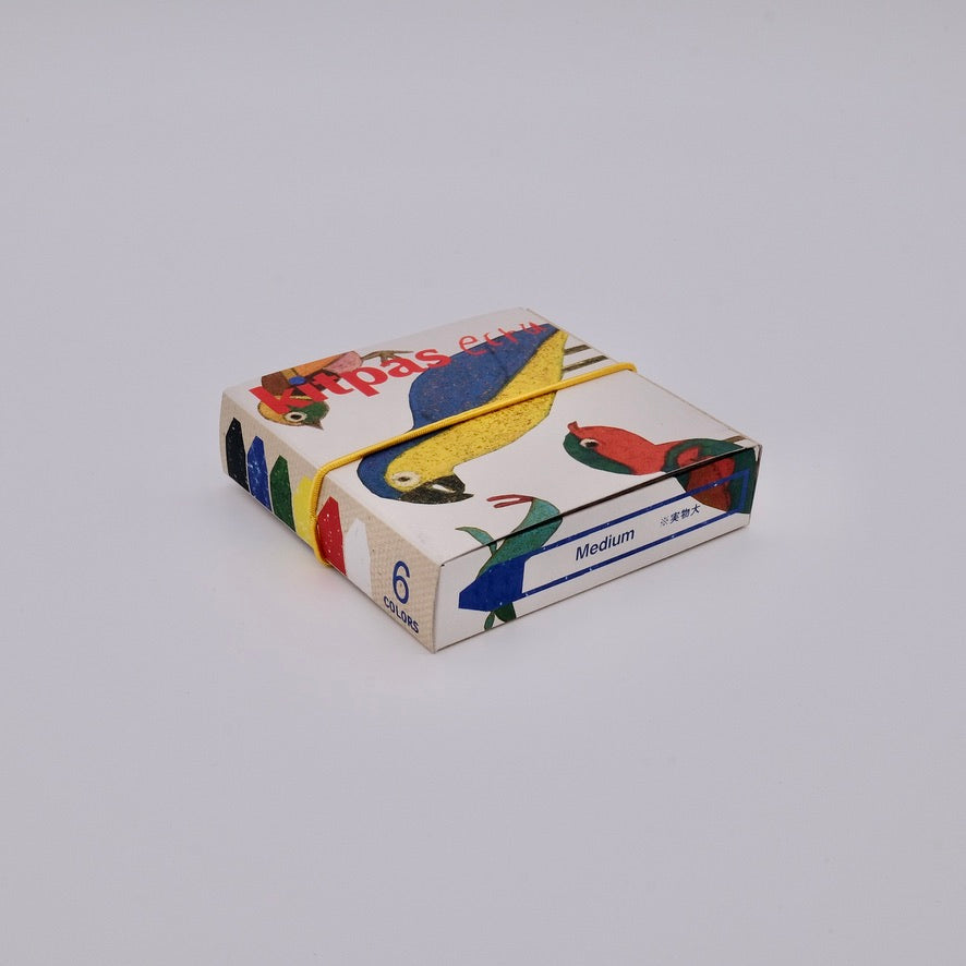 Colorful box with cartoon characters on a gray background