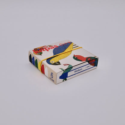 Colorful box with cartoon characters on a gray background