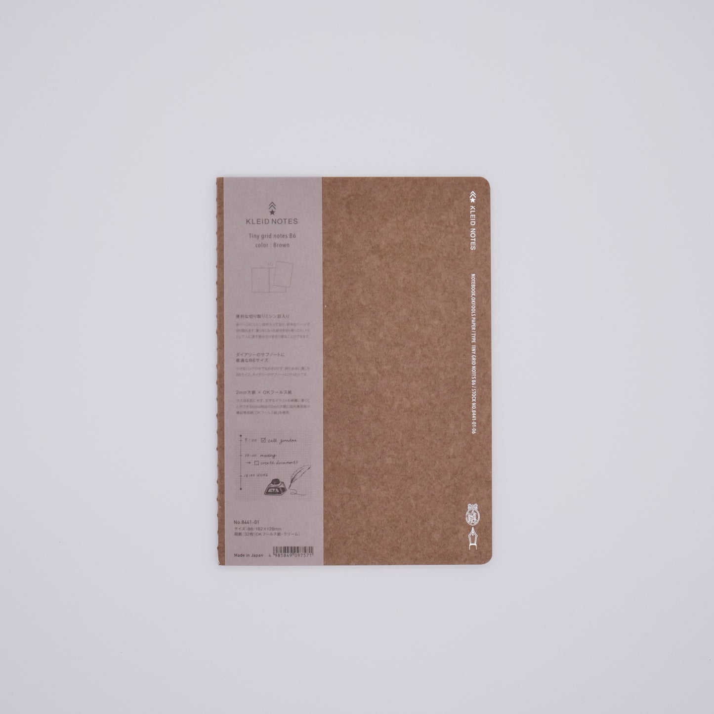 Brown notebook with text on a white background