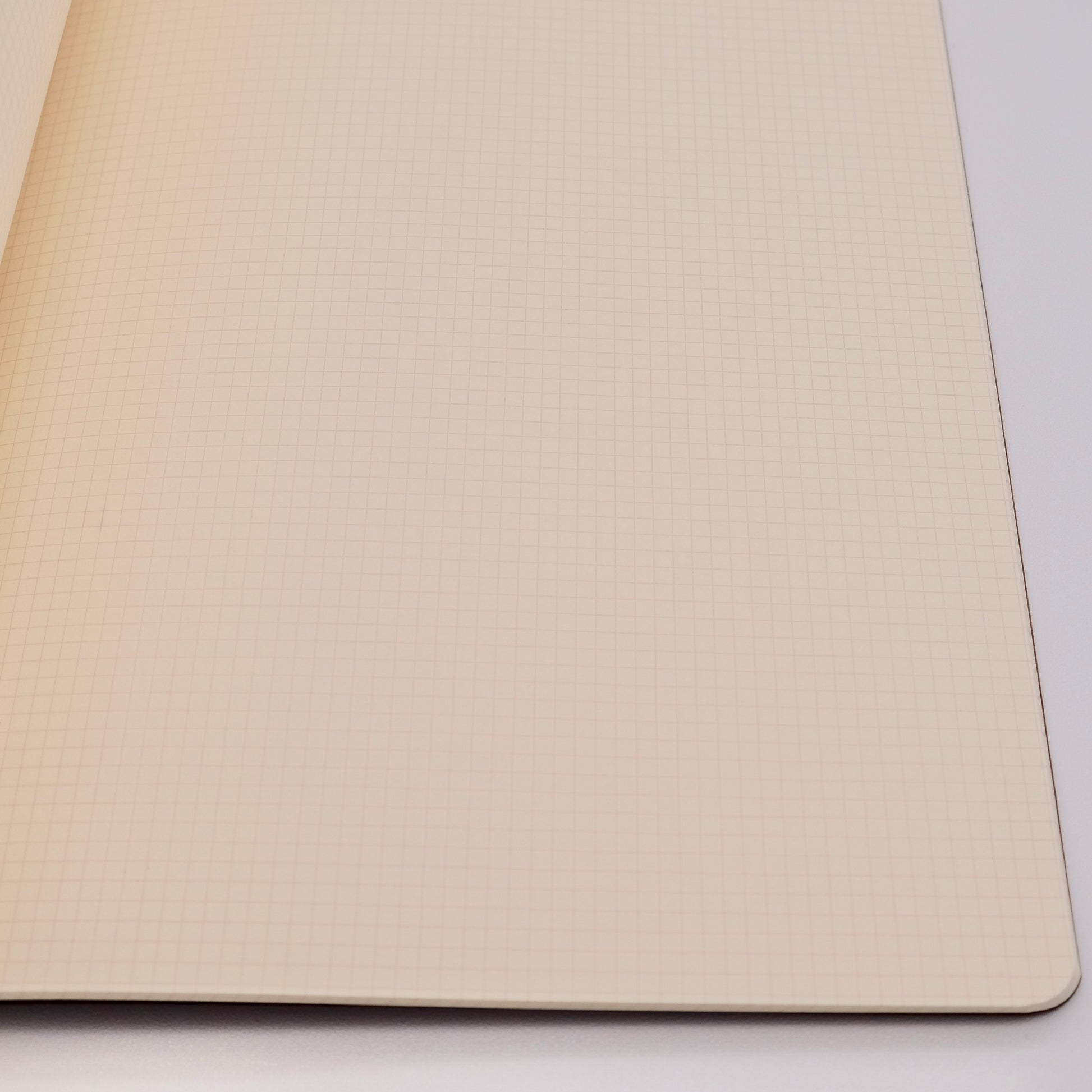 Beige textured mouse pad on a white background