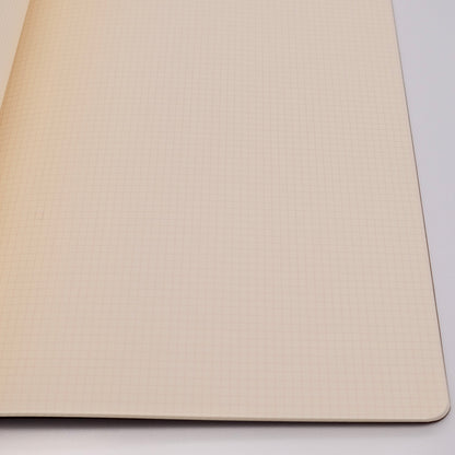 Beige textured mouse pad on a white background