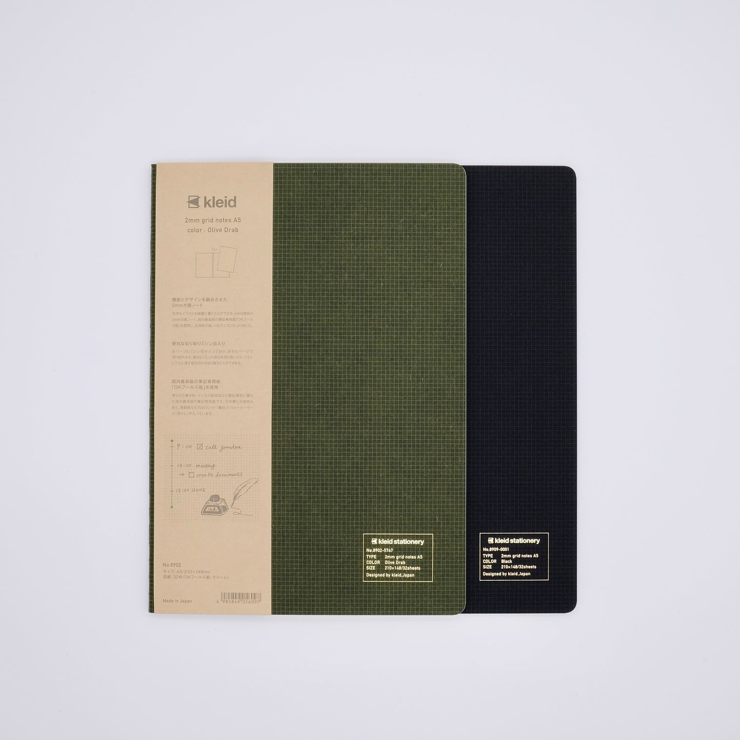 Two
 notebooks with different covers on a light gray background