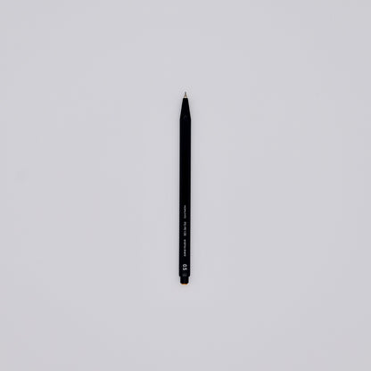 Black mechanical pencil on a light gray background