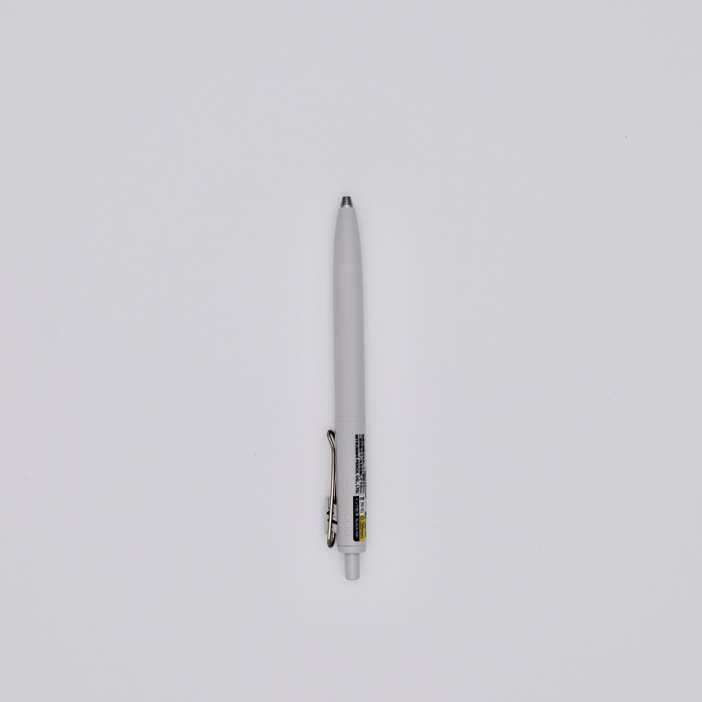 White pen on a light gray background